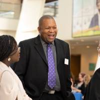 Guests talking at Enrichment.